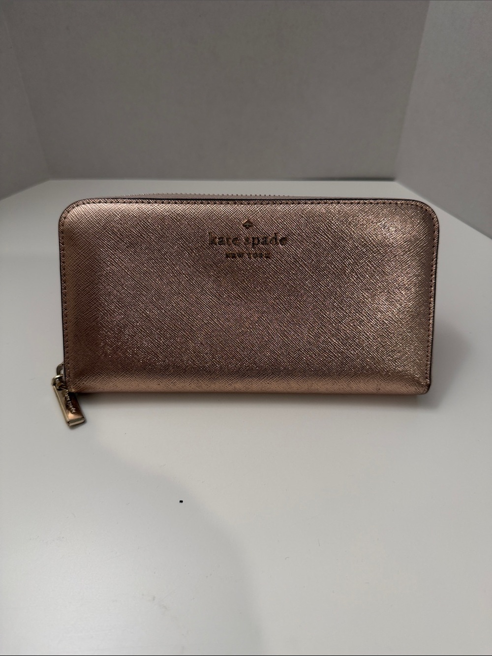kate spade metallic rose gold zip-around card & key holder